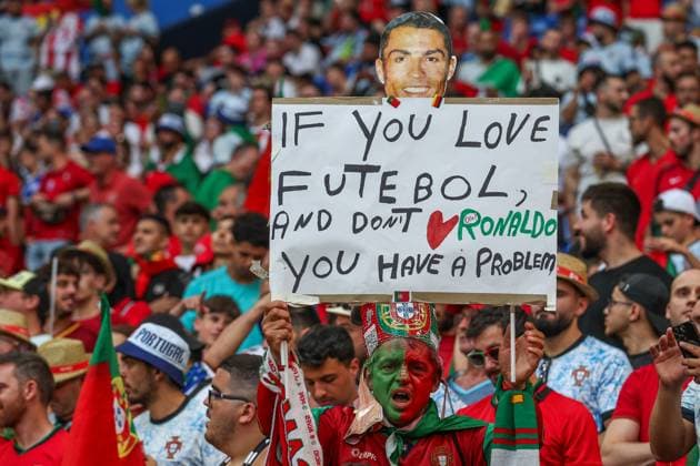 EM 2024 Georgia Portugal on 26 06 2024 in the Arena AufSchalke in Gelsenkirchen The Portugal fans , here with a sign poster If you love futebol and don™t love Ronaldo you have a problem MH