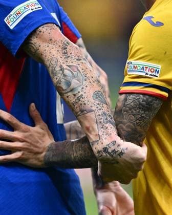 FRANKFURT AM MAIN, GERMANY - JUNE 26: tattoos during the UEFA EURO, EM, Europameisterschaft,Fussball 2024 group stage match between Slovakia and Romania at Frankfurt Arena on June 26, 2024 in Frankfurt am Main, Germany. Photo by Sebastian Frej Slovakia v Romania: Group E - UEFA EURO 2024 Copyright: xSebastianxFrejx