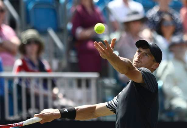 27th June 2024; Devonshire Park, Eastbourne, East Sussex, England: Rothesay International Eastbourne, Day 4; Billy Harris (GBR) serves to Flavio Cobolli (ITA) in the mens singles quarter-final match  ActionPlus12661019 HongboxChen
