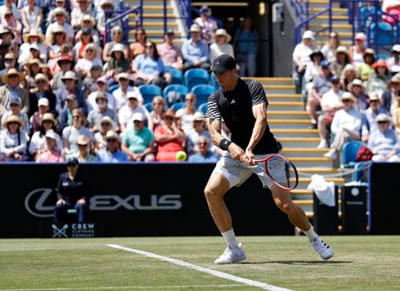 27th June 2024; Devonshire Park, Eastbourne, East Sussex, England: Rothesay International Eastbourne, Day 4; Billy Harris (GBR) plays a backhand against Flavio Cobolli (ITA) in the mens singles quarter-final match  ActionPlus12661033 HongboxChen