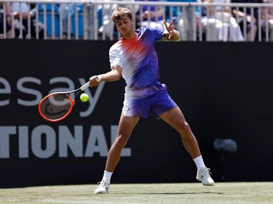 27th June 2024; Devonshire Park, Eastbourne, East Sussex, England: Rothesay International Eastbourne, Day 4; Flavio Cobolli (ITA) plays a forehand Billy Harris (GBR) in the mens singles quarter-final match  ActionPlus12661028 HongboxChen