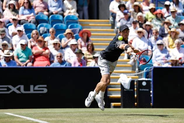 27th June 2024; Devonshire Park, Eastbourne, East Sussex, England: Rothesay International Eastbourne, Day 4; Billy Harris (GBR) plays a backhand against Flavio Cobolli (ITA) in the mens singles quarter-final match  ActionPlus12661029 HongboxChen