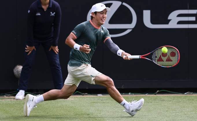 27th June 2024; Devonshire Park, Eastbourne, East Sussex, England: Rothesay International Eastbourne, Day 4; Yoshihito Nishioka (JPN) plays a forehand against Aleksandar Vukic (AUS) in the quarter finals match  ActionPlus12661085 HongboxChen