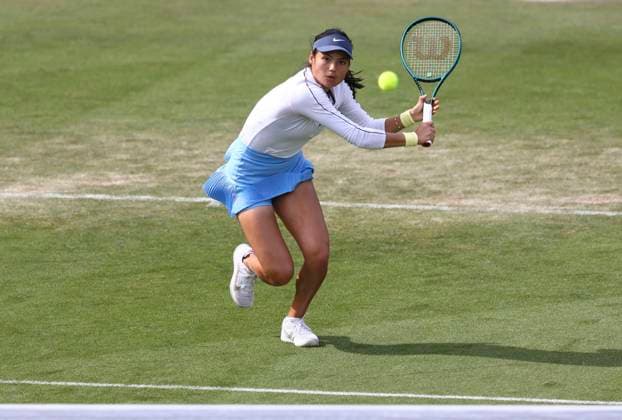 27th June 2024; Devonshire Park, Eastbourne, East Sussex, England: Rothesay International Eastbourne, Day 4, Emma Raducanu (GBR) plays a backhand against Daria Kasatkina in the quarter finals match  ActionPlus12661095 HongboxChen