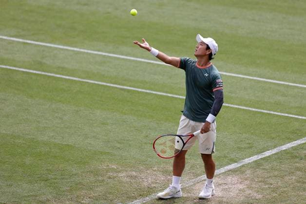 27th June 2024; Devonshire Park, Eastbourne, East Sussex, England: Rothesay International Eastbourne, Day 4; Yoshihito Nishioka (JPN) serves to Aleksandar Vukic (AUS) in the quarter finals match  ActionPlus12661126 HongboxChen