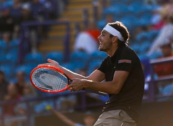 27th June 2024; Devonshire Park, Eastbourne, East Sussex, England: Rothesay International Eastbourne, Day 4; Taylor Fritz (USA) shows emotion during the match against Juncheng Shang (CHN) in the mens quarter-final match  ActionPlus12661167 HongboxChen