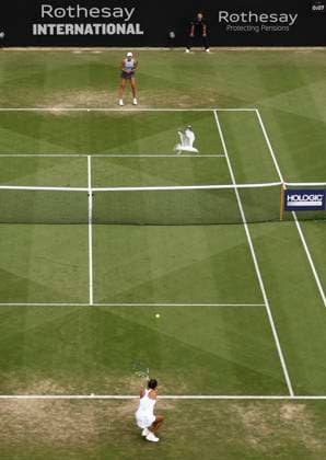 28th June 2024; Devonshire Park, Eastbourne, East Sussex, England: Rothesay International Eastbourne, Day 5, Leylah Fernadez (CAN) serves to Madison Keys (USA) in the womens singles semi-final match as a seagull flies across the court  ActionPlus12661173 HongboxChen