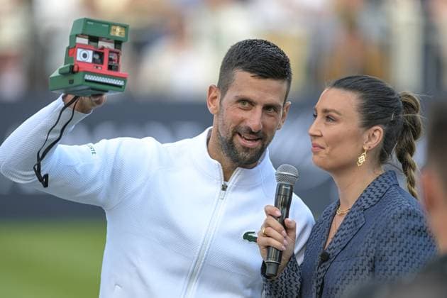 Novac Djokovic wins the second ATP, Tennis Herren Exhibition single mnatch against Daniil Medvedev and shares his want for a Polaroid selfie at the end of the game during the Giorgio Armani Tennis Classic at the Hurlingham Club, London, UK on 28 June 2024. Copyright: xPhilxHutchinsonx 41280043