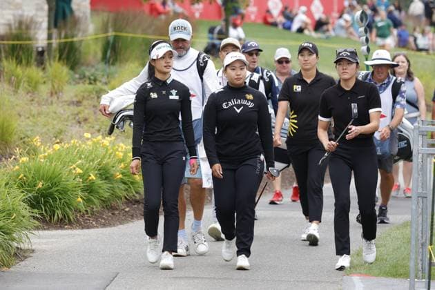 MIDLAND, MI - JUNE 28: LPGA, Golf Damen golfers Jaravee Boonchant and Chanettee Wannasaen walk the 18th hole during the LPGA Dow Championship on June 28, 2024, at Midland Country Club in Midland, Michigan. (Photo by Brian Spurlock Icon Sportswire) GOLF: JUN 28 LPGA Dow Championship EDITORIAL USE ONLY Icon240628113