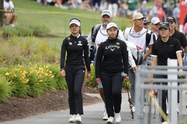 MIDLAND, MI - JUNE 28: LPGA, Golf Damen golfers Jaravee Boonchant and Chanettee Wannasaen walk the 18th hole during the LPGA Dow Championship on June 28, 2024, at Midland Country Club in Midland, Michigan. (Photo by Brian Spurlock Icon Sportswire) GOLF: JUN 28 LPGA Dow Championship EDITORIAL USE ONLY Icon240628114