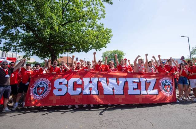 Football, men, 2023 24 season, Euro 2024 round of 16 in Berlin, Switzerland Italy, Swiss fan march, 29 06 2024, Copyright: xSebastianxRäppold MatthiasxKochx