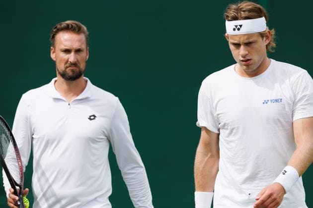 Bergs coach Ruben Bemelmans and Belgian Zizou Bergs pictured during a training session during preparations ahead of the 2024 Wimbledon grand slam tennis tournament at the All England Tennis Club, in south-west London, Britain, Saturday 29 June 2024. BENOITxDOPPAGNE  x95494801x