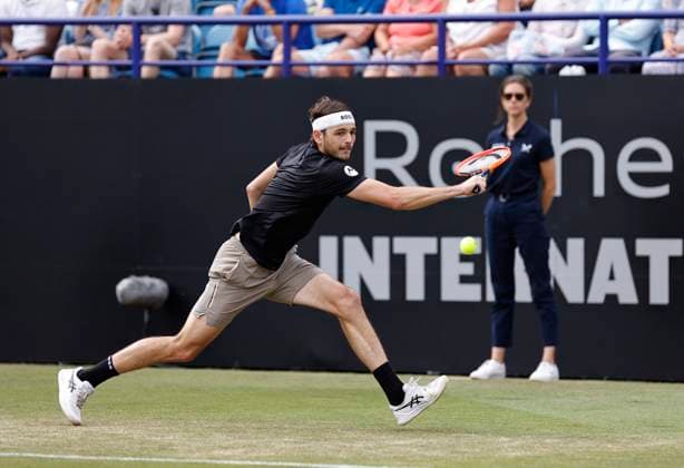 29th June 2024; Devonshire Park, Eastbourne, East Sussex, England: Rothesay International Eastbourne, Day 6; Taylor Fritz (USA) plays a backhand against Max Purcell (AUS) in the mens singles final match  ActionPlus12661534 HongboxChen