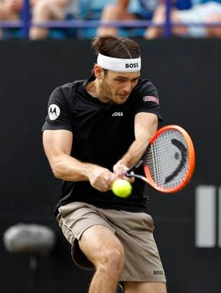 29th June 2024; Devonshire Park, Eastbourne, East Sussex, England: Rothesay International Eastbourne, Day 6; Taylor Fritz (USA) plays a backhand against Max Purcell (AUS) in the mens singles final match  ActionPlus12661536 HongboxChen