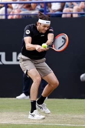29th June 2024; Devonshire Park, Eastbourne, East Sussex, England: Rothesay International Eastbourne, Day 6; Taylor Fritz (USA) plays a backhand against Max Purcell (AUS) in the mens singles final match  ActionPlus12661533 HongboxChen
