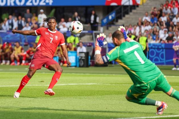 Goalkeeper Gianluigi Donnarumma of Italy saves from Breel Embolo of Switzerland Switzerland v Italy, UEFA European Championship, EM, Europameisterschaft 2024, Round of 16, Football, Olympiastadion, Berlin, Germany - 29 Jun 2024 EDITORIAL USE ONLY No use with unauthorised audio, video, data, fixture lists, club league logos or live services. Online in-match use limited to 120 images, no video emulation. No use in betting, games or single club league player publications. Copyright: xPaulxCurrie Shutterstockx 14562043au