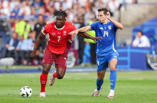 Breel Embolo of Switzerland and Federico Chiesa of Italy Switzerland v Italy, UEFA European Championship, EM, Europameisterschaft 2024, Round of 16, Football, Olympiastadion, Berlin, Germany - 29 Jun 2024 EDITORIAL USE ONLY No use with unauthorised audio, video, data, fixture lists, club league logos or live services. Online in-match use limited to 120 images, no video emulation. No use in betting, games or single club league player publications. Copyright: xPaulxCurrie Shutterstockx 14562043aw