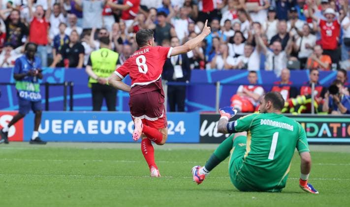 Remo Freuler celebrates after 1 0, goalkeeper Gianluigi Donnarumma on the ground Joy Emotion Cheering Sport Football Soccer European Championship Euro 2024 European Championship Men Season 2023 2024 29 06 2024 Switzerland SUI vs Italy ITA in Berlin DFL regulations prohibit any use of photographs as image sequences and or quasi video