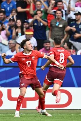 BERLIN, GERMANY - JUNE 29: Remo Freuler of Switzerland celebrate with Ruben Vargas after scoring the first goal during the match between Switzerland and Italy on Round of 16 - UEFA EURO, EM, Europameisterschaft,Fussball 2024 at Olympiastadion on June 28, 2024 in Berlin, Germany. Photo by Sebastian Frej Switzerland v Italy - Round of 16 - UEFA EURO 2024 Copyright: xSebastianxFrejx
