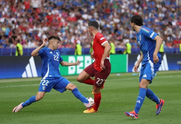 Alessandro Bastoni of Italy and Fabian Schär of Switzerland Switzerland v Italy, UEFA European Championship, EM, Europameisterschaft 2024, Round of 16, Football, Olympiastadion, Berlin, Germany - 29 Jun 2024 EDITORIAL USE ONLY No use with unauthorised audio, video, data, fixture lists, club league logos or live services. Online in-match use limited to 120 images, no video emulation. No use in betting, games or single club league player publications. Copyright: xPaulxCurrie Shutterstockx 14562043bj