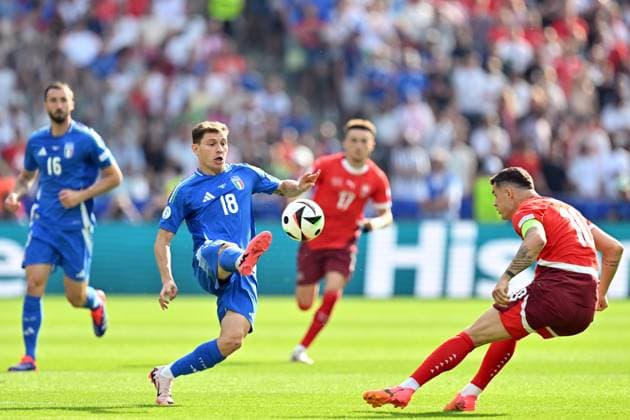 290624 KAI SCHWOERER Nicolo Fagioli of Italy controls the ball against Granit Xhaka of Switzerland during the UEFA EURO, EM, Europameisterschaft,Fussball 2024 round of 16 match between Switzerland and Italy at Olympiastadion on June 29, 2024 in Berlin, Germany. 290624-CPL-SUIvITA-004