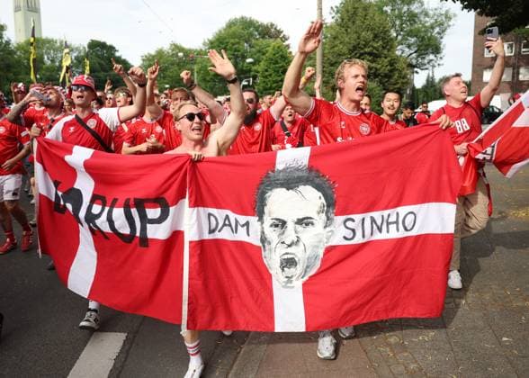 Dortmund, Germany, 29th June 2024. Denmark fans arriving early to join in the atmosphere before the UEFA European Championships Group 16 match at the BVB Stadion, Dortmund. Picture credit should read: Paul Terry Sportimage EDITORIAL USE ONLY. No use with unauthorised audio, video, data, fixture lists, club league logos or live services. Online in-match use limited to 120 images, no video emulation. No use in betting, games or single club league player publications. SPI-3213-0005