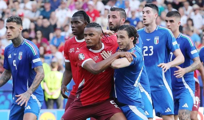 Manuel Akanji in a duel with Matteo Darmian Sport Football Soccer European Championship Euro 2024 European Championship Men Season 2023 2024 29 06 2024 Switzerland SUI vs Italy ITA in Berlin DFL regulations prohibit any use of photographs as image sequences and or quasi video