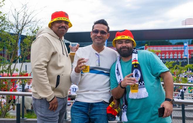 German fans smile, UEFA EURO 2024 Round of 16, Germany vs Denmark, BVB Stadium Dortmund on June 29, 2024 in Dortmund, Germany Photo by Silas Schueller DeFodi Images Fans of Germany smile, UEFA EURO 2024 Round of 16, Germany vs Denmark, BVB Stadium Dortmund on June 29, 2024 in Dortmund, Germany Photo by Silas Schueller DeFodi Images Defodi 738 738 GERDEN 20240629 144 Defodi-738
