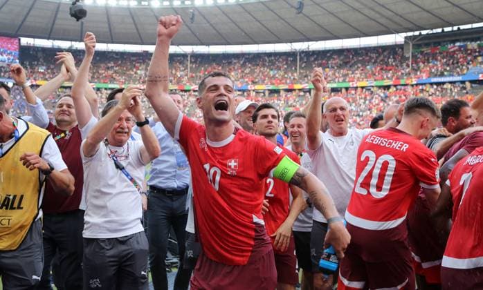 Granit Xhaka, Swiss team cheers after the end of the match 2 0 victory joy emotion jubilation sport soccer soccer European Championship Euro 2024 European Championship men season 2023 2024 29 06 2024 Switzerland SUI vs Italy ITA in Berlin DFL regulations prohibit any use of photographs as image sequences and or quasi video