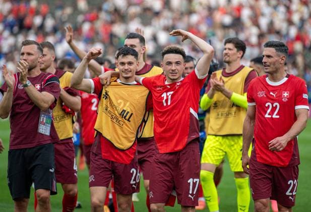 Football, men, season 2023 24, Euro 2024 round of 16 in Berlin, Switzerland Italy, f l Silvan Widmer Switzerland , Fabian Rieder Switzerland , Ruben Vargas Switzerland , Fabian Schär Switzerland , cheering after the final whistle, 29 06 2024, Copyright: xSebastianxRäppold MatthiasxKochx