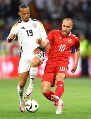 Leroy Sane of Germany and Christian Eriksen of Denmark Germany v Denmark, UEFA European Championship, EM, Europameisterschaft 2024, Round of 16, Football, BVB Stadion, Dortmund, Germany - 29 Jun 2024 EDITORIAL USE ONLY No use with unauthorised audio, video, data, fixture lists, club league logos or live services. Online in-match use limited to 120 images, no video emulation. No use in betting, games or single club league player publications. Copyright: xKieranxMcManus Shutterstockx 14562066y