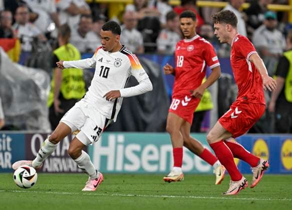 29 06 2024, Football UEFA EURO 2024, Round of 16, Germany Denmark, at the BVB Arena Dortmund, Jamal Musiala Germany prevails