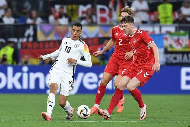 Soccer UEFA EURO 2024 Round of 16 Germany Denmark on 29 06 2024 at BVB Stadion Dortmund in Dortmund Jamal Musiala Germany , left Joachim Andersen Denmark , center Andreas Skov Olsen Denmark , right xRx