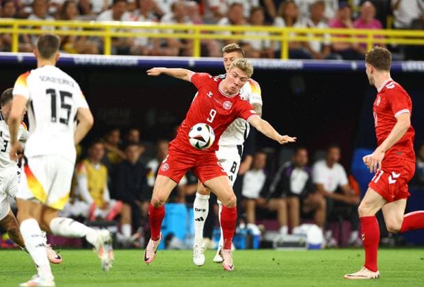 Rasmus Hojlund of Denmark and Toni Kroos of Germany Germany v Denmark, UEFA European Championship, EM, Europameisterschaft 2024, Round of 16, Football, BVB Stadion, Dortmund, Germany - 29 Jun 2024 EDITORIAL USE ONLY No use with unauthorised audio, video, data, fixture lists, club league logos or live services. Online in-match use limited to 120 images, no video emulation. No use in betting, games or single club league player publications. Copyright: xKieranxMcManus Shutterstockx 14562066aa