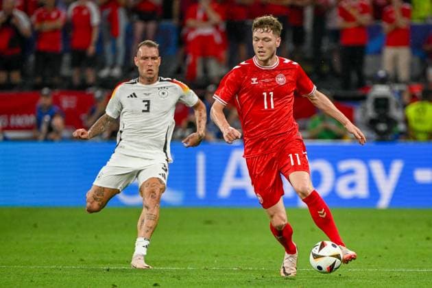 Soccer, Men, Season 2023 24, Euro EM 2024 Round of 16 in Dortmund , Germany Denmark, David Raum Germany and Andreas Skov Olsen Denmark in a duel , 29 06 2024, Copyright: xMatthiasxKochx