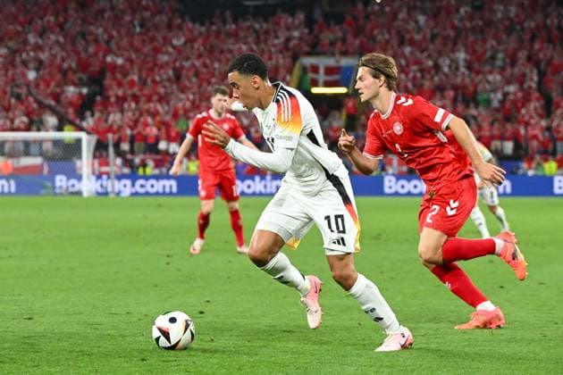 Soccer, Men, Season 2023 24, Euro EM 2024 Round of 16 in Dortmund , Germany Denmark, Jamal Musiala Germany and Joachim Andersen Denmark in a duel , 29 06 2024, Copyright: xMatthiasxKochx