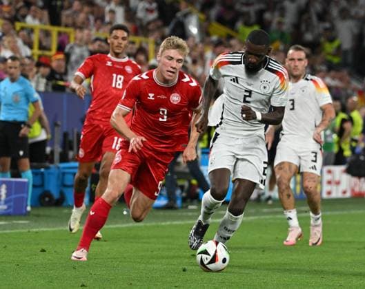 29 06 2024, xsltx, Football EM 2024 1 8 Final, Germany Denmark emspor, v l Rasmus Winther Hojlund Denmark Daenemark , Antonio Rüdiger Deutsche Fussball Nationalmannschaft DFB DFL DFB REGULATIONS PROHIBIT ANY USE OF PHOTOGRAPHS as IMAGE SEQUENCES and or QUASI VIDEO Dortmund
