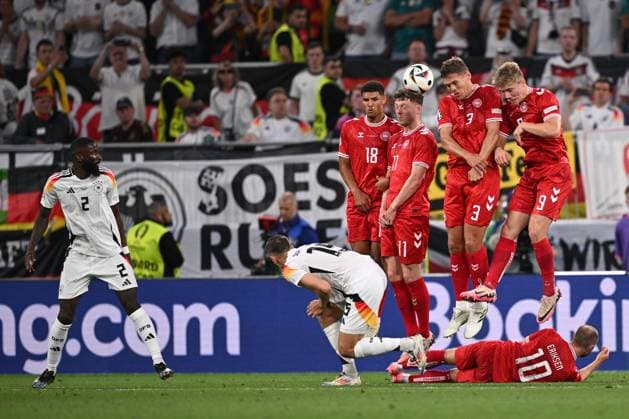 Germany Soccer Euro 2024 Germany - Denmark 8719296 29.06.2024 Denmark s players jump into the air to try to stop the ball during the UEFA EURO, EM, Europameisterschaft,Fussball 2024 Round of 16 soccer match between Germany and Denmark at the BVB Stadion Dortmund, in Dortmund, Germany. Alexey Filippov Sputnik Dortmund Germany  Copyright: xAlexeyxFilippovx