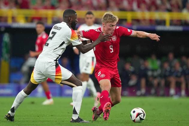 Germany s Antonio Rudiger fight for the ball with Denmark s Rasmus Hojlund during the Euro 2024 soccer match between Germany and Denmark at the BVB Stadium , Dortmund , Germany - Saturday 29 June 2024. - Soccer .  Copyright: xSpada LaPressex