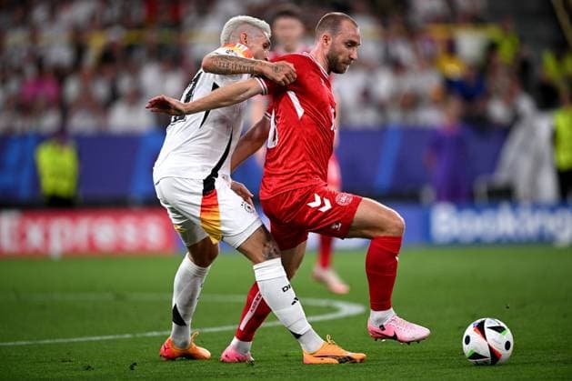 Germany Soccer Euro 2024 Germany - Denmark 8719302 29.06.2024 Denmark s Christian Eriksen, right, struggles for the ball during the UEFA EURO, EM, Europameisterschaft,Fussball 2024 Round of 16 soccer match between Germany and Denmark at the BVB Stadion Dortmund, in Dortmund, Germany. Alexey Filippov Sputnik Dortmund Germany  Copyright: xAlexeyxFilippovx