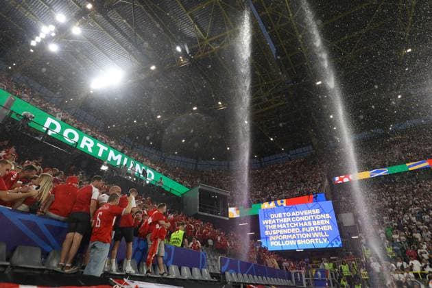 Denmark fans look on as water pours through the roof Germany v Denmark, UEFA European Championship, EM, Europameisterschaft 2024, Round of 16, Football, BVB Stadion, Dortmund, Germany - 29 Jun 2024 EDITORIAL USE ONLY No use with unauthorised audio, video, data, fixture lists, club league logos or live services. Online in-match use limited to 120 images, no video emulation. No use in betting, games or single club league player publications. Copyright: xKieranxMcManus Shutterstockx 14562066au