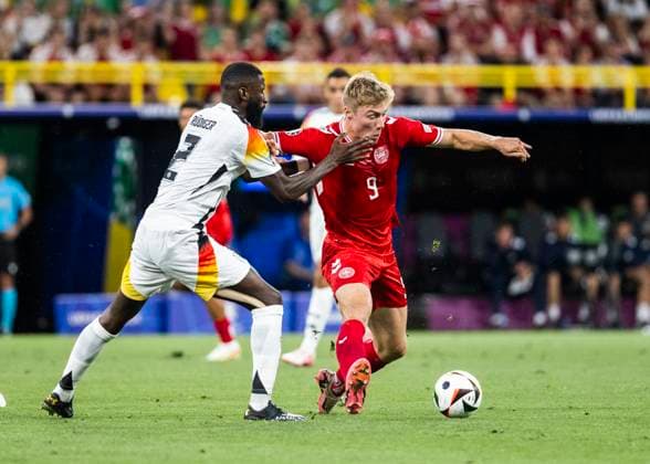 Dortmund, Signal Iduna Park, 29 06 2024 Antonio Ruediger of germany challenges Rasmus Hoejlund of denmark during the match UEFA European Championship 2024 Germany v Denmark