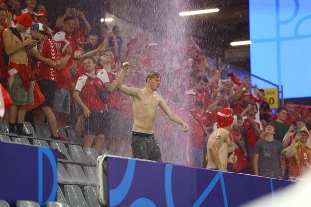 Denmark fans party in the water pouring through the roof Germany v Denmark, UEFA European Championship, EM, Europameisterschaft 2024, Round of 16, Football, BVB Stadion, Dortmund, Germany - 29 Jun 2024 EDITORIAL USE ONLY No use with unauthorised audio, video, data, fixture lists, club league logos or live services. Online in-match use limited to 120 images, no video emulation. No use in betting, games or single club league player publications. Copyright: xKieranxMcManus Shutterstockx 14562066az