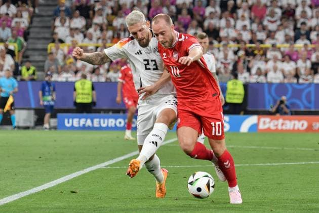 v li in duel Robert Andrich 23 Germany Christian Eriksen 10 Denmark 29 06 2024 European Football Championship in Germany Germany vs Denmark, Signal Iduna Park, Dortmund, NRW Germany Copyright: xpepphotox xHorstxMauelshagenx pep00321, pep_20240629_hm