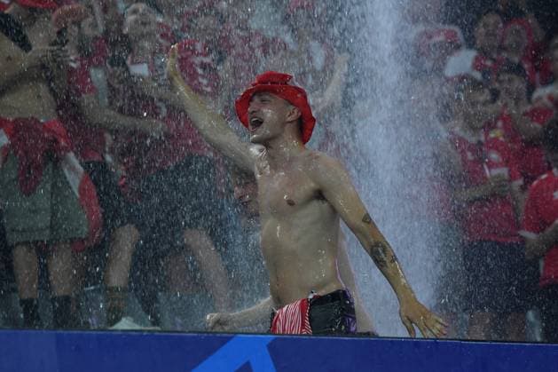 Soccer UEFA EURO 2024 Round of 16 Germany Denmark on 29 06 2024 at BVB Stadion Dortmund in Dortmund Fans spectators Denmark jumping in the rain xRx