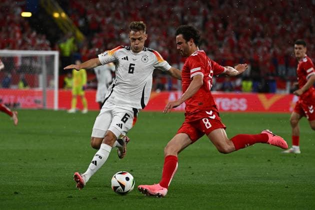29 06 2024, xpsx, Football EM 2024 1 8 Final, Germany Denmark emspor, v l Joshua Kimmich Deutsche Fussball Nationalmannschaft DFB Thomas Joseph Delaney Denmark Daenemark Zweikampf, Aktion, action, battle for the ball DFL DFB REGULATIONS PROHIBIT ANY USE OF PHOTOGRAPHS as IMAGE SEQUENCES and or QUASI VIDEO Dortmund