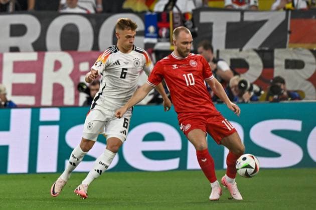 from left in duel Joshua Kimmich 6 Germany Christian Eriksen 10 Denmark 29 06 2024 European Football Championship in Germany Germany vs Denmark, Signal Iduna Park, Dortmund, NRW Germany Copyright: xpepphotox xHorstxMauelshagenx pep00321, pep_20240629_hm
