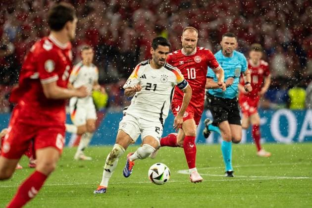 GER, Euro 2024, round of sixteen, Germany Germany, GER vs Denmark Denmark, DNK 29 06 2024, Signal Iduna Park BVB Stadion Dortmund , Dortmund, GER, Euro 2024, round of sixteen, Germany Germany Germany, GER vs Denmark Denmark, DNK In the picture Ilkay Gündogan Guendogan Germany Germany GER, 21 in the rain, single action full body full body ball on foot nordphotoxGmbHxx xChristianxSchulze nph000300