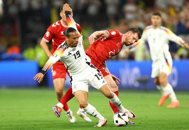 Pierre-Emile Hojbjerg of Denmark and Leroy Sane of Germany Germany v Denmark, UEFA European Championship, EM, Europameisterschaft 2024, Round of 16, Football, BVB Stadion, Dortmund, Germany - 29 Jun 2024 EDITORIAL USE ONLY No use with unauthorised audio, video, data, fixture lists, club league logos or live services. Online in-match use limited to 120 images, no video emulation. No use in betting, games or single club league player publications. Copyright: xKieranxMcManus Shutterstockx 14562066bf