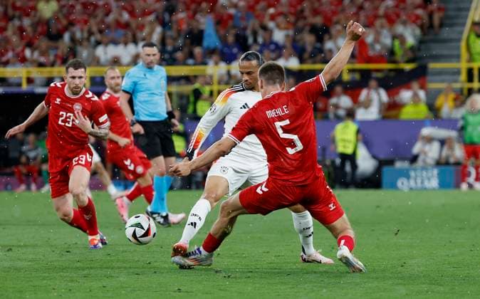 29 06 2024, Football, Euro 2024, Round of 16, Germany - Denmark, GER, Dortmund, BVB Stadion Picture from left Pierre Emile Hojbjerg Denmark, 23 , Leroy Sane Germany, 19 and Joakim Mahle Denmark, 5 Copyright: HMBxMedia xHeikoxBecker